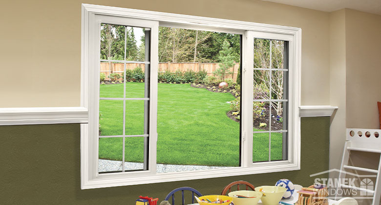 White framed three-lite sliding window