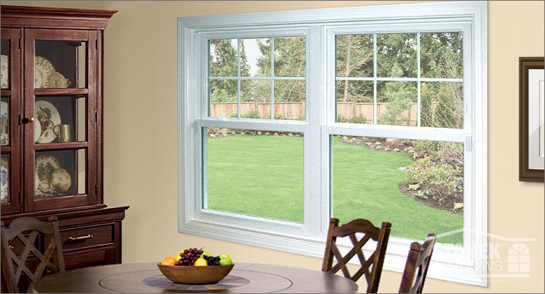 Stanek Windows with white trim in a residential dining room